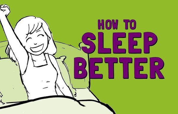 Person sleeping peacefully in a cozy, dark bedroom — representing healthy sleep hygiene habits like routine, relaxation, and comfort.
